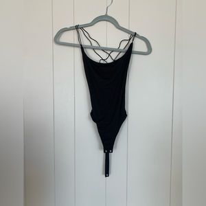 Black backless bodysuit never worn